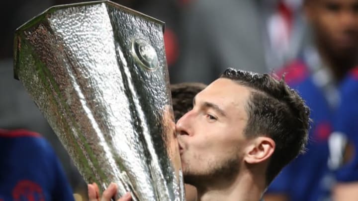 STOCKHOLM, SWEDEN – MAY 24: Matteo Darmian of Manchester United kisses the trophy during the UEFA Europa League Final match between Ajax and Manchester United at Friends Arena on May 24, 2017 in Stockholm, Sweden. (Photo by Ian MacNicol/Getty Images)