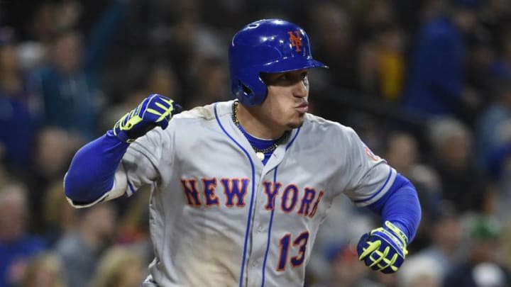 SAN DIEGO, CA - APRIL 27: Asdrubal Cabrera #13 of the New York Mets reacts after hitting a three-run home run during the seventh inning of a baseball game against the San Diego Padres at PETCO Park on April 27, 2018 in San Diego, California. (Photo by Denis Poroy/Getty Images)