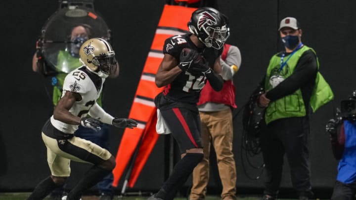 Jan 9, 2022; Atlanta, Georgia, USA; Atlanta Falcons wide receiver Russell Gage (14) catches a touchdown pass in front of New Orleans Saints cornerback Ken Crawley (25) during the second half at Mercedes-Benz Stadium. Mandatory Credit: Dale Zanine-USA TODAY Sports