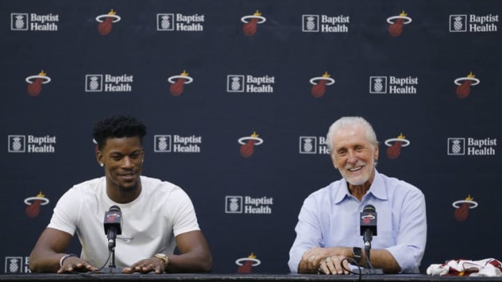 Jimmy Butler #22 of the Miami Heat and president Pat Riley speak to the media during his introductory press conference at American Airlines Arena (Photo by Michael Reaves/Getty Images)