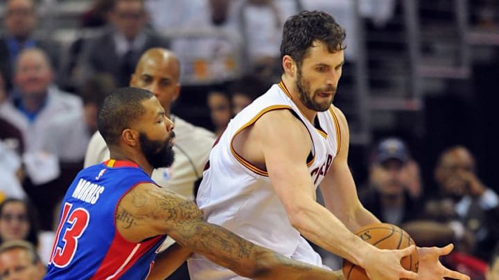 Apr 17, 2016; Cleveland, OH, USA; Detroit Pistons forward Marcus Morris (13) defends Cleveland Cavaliers forward Kevin Love (0) during the first quarter in game one of the first round of the NBA Playoffs at Quicken Loans Arena. Mandatory Credit: Ken Blaze-USA TODAY Sports