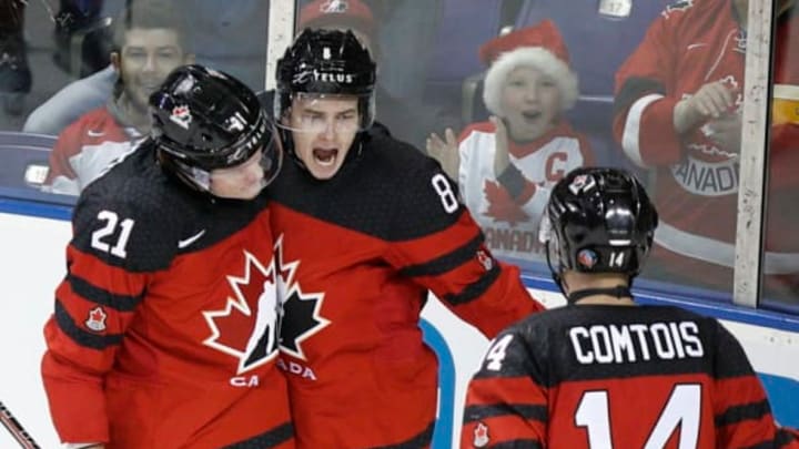 VICTORIA, BC – DECEMBER 19: Cody Glass #8 of Team Canada celebrates his goal with teammates (L-R) Owen Tippett #21 and Maxime Comtois #14 versus Team Switzerland at the IIHF World Junior Championships at the Save-on-Foods Memorial Centre on December 19, 2018, in Victoria, British Columbia, Canada. Canada defeated Switzerland 5-3. (Photo by Kevin Light/Getty Images)”n”n”n”n