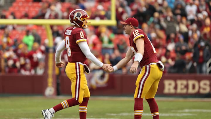LANDOVER, MD - DECEMBER 17: Quarterback Kirk Cousins #8 of the Washington Redskins celebrates with quarterback Colt McCoy #12 after throwing a touchdown in the first quarter against the Arizona Cardinals at FedEx Field on December 17, 2017 in Landover, Maryland. (Photo by Patrick Smith/Getty Images)