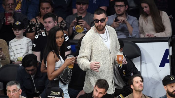 LOS ANGELES, CA - FEBRUARY 21: Travis Kelce #87 of the Kansas City Chiefs and Kayla Nicole attend the Los Angeles Lakers and Memphis Grizzlies basketball game at Staples Center on February 21, 2020 in Los Angeles, California. (Photo by Kevork S. Djansezian/Getty Images)