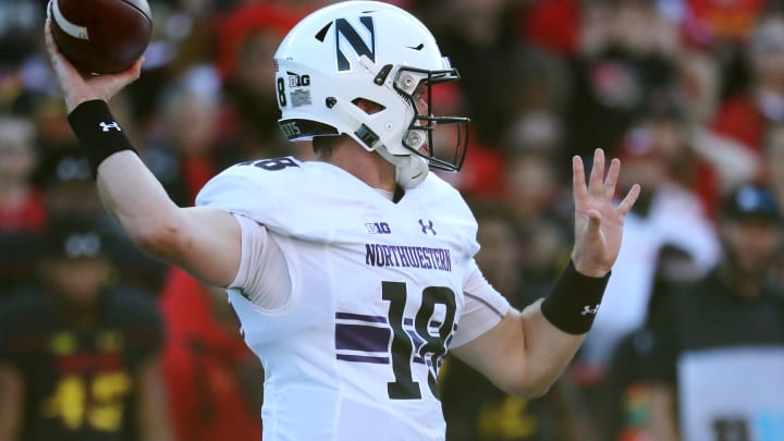 COLLEGE PARK, MD – OCTOBER 14: Quarterback Clayton Thorson #18 of the Northwestern Wildcats throws a first half pass against the Maryland Terrapins at Capital One Field on October 14, 2017 in College Park, Maryland. (Photo by Rob Carr/Getty Images)