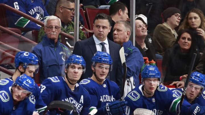 VANCOUVER, BC - DECEMBER 15: Head coach Travis Green of the Vancouver Canucks looks on from the bench during their NHL game against the Philadelphia Flyers at Rogers Arena December 15, 2018 in Vancouver, British Columbia, Canada. Vancouver won 5-1. (Photo by Jeff Vinnick/NHLI via Getty Images)