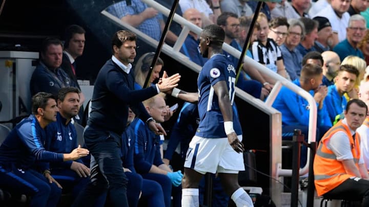 NEWCASTLE UPON TYNE, ENGLAND - AUGUST 13: Moussa Sissoko of Tottenham Hotspur and Mauricio Pochettino, Manager of Tottenham Hotspur shake hands after he is subbed off during the Premier League match between Newcastle United and Tottenham Hotspur at St. James Park on August 13, 2017 in Newcastle upon Tyne, England. (Photo by Stu Forster/Getty Images)