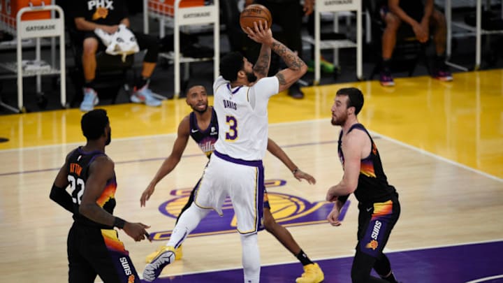 May 9, 2021; Los Angeles, California, USA; Los Angeles Lakers forward Anthony Davis (3) goes up for a shot in front of Phoenix Suns forward Frank Kaminsky (8) during the first half at Staples Center. Mandatory Credit: Kelvin Kuo-USA TODAY Sports May 9, 2021; Los Angeles, California, USA; Los Angeles Lakers forward Anthony Davis (3) goes up for a shot in front of Phoenix Suns forward Frank Kaminsky (8) during the first half at Staples Center. Mandatory Credit: Kelvin Kuo-USA TODAY Sports