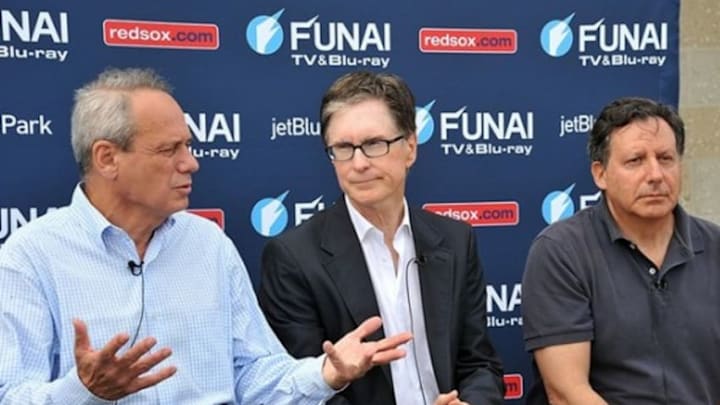 Feb 25, 2012; Fort Myers FL, USA; Boston Red Sox president chief executive officer Larry Lucchino (left), owner John W. Henry (center), and chairman Thomas Werner (right) hold a press conference prior to spring training at JetBlue Park. Mandatory Credit: Steve Mitchell-USA TODAY Sports