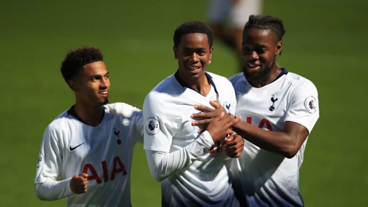 STEVENAGE, ENGLAND - AUGUST 24: Shayon Harrison of Tottenham Hotspur (C) celebrates scoring a goal with Josh Onomah (R) and Marcus Edwards (L) during the Premier League 2 match between Tottenham Hotspur v Brighton & Hove Albion at The Lamex Stadium on August 24, 2018 in Stevenage, England. (Photo by Marc Atkins/Getty Images)