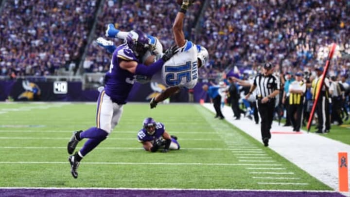 MINNEAPOLIS, MN – NOVEMBER 6: Golden Tate #15 of the Detroit Lions leaps into the end zone for the go ahead touchdown while being tackled by Andrew Sendejo #34 of the Minnesota Vikings during overtime on November 6, 2016 at US Bank Stadium in Minneapolis, Minnesota. (Photo by Stacy Revere/Getty Images)
