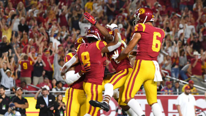 LOS ANGELES, CA - SEPTEMBER 07: Wide receiver Amon-Ra St. Brown #8 of the USC Trojans celebrates with Velus Jones Jr. #1, Tyler Vaughns #21 and Michael Pittman Jr. #6 after a touch down in the first half of the game against the Stanford Cardinal at the Los Angeles Memorial Coliseum on September 7, 2019 in Los Angeles, California. (Photo by Jayne Kamin-Oncea/Getty Images)