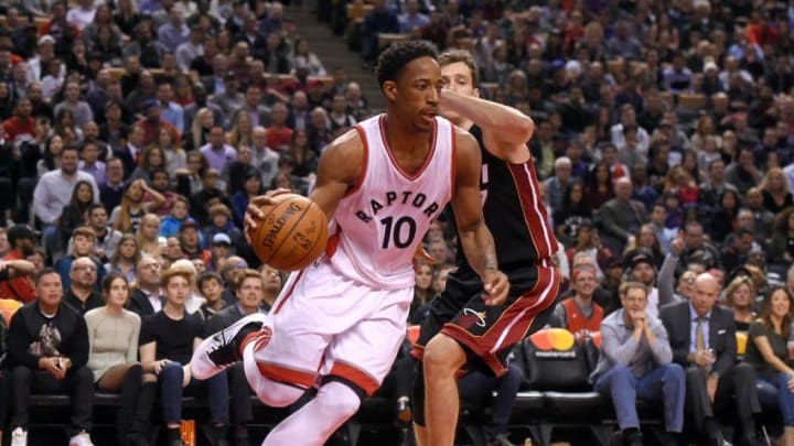 Nov 4, 2016; Toronto, Ontario, CAN; Toronto Raptors guard DeMar DeRozan (10) drives for a basket past Miami Heat guard Goran Dragic (7) in the second half at Air Canada Centre. DeRozan scored 34 points in a 96-87 win for Toronto. Mandatory Credit: Dan Hamilton-USA TODAY Sports