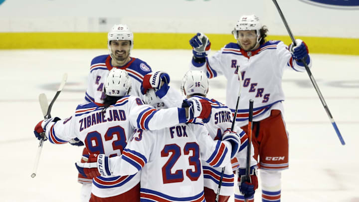 May 13, 2022; Pittsburgh, Pennsylvania, USA; the New York Rangers celebrate a goal by center Mika Zibanejad (93) against the Pittsburgh Penguins during the second period in game six of the first round of the 2022 Stanley Cup Playoffs at PPG Paints Arena. Mandatory Credit: Charles LeClaire-USA TODAY Sports