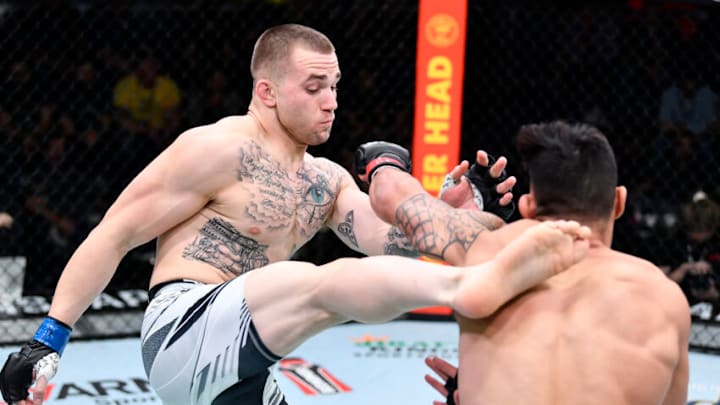 LAS VEGAS, NEVADA - FEBRUARY 05: (L-R) Nick Maximov kicks Punahele Soriano in their middleweight fight during the UFC Fight Night event at UFC APEX on February 05, 2022 in Las Vegas, Nevada. (Photo by Chris Unger/Zuffa LLC)