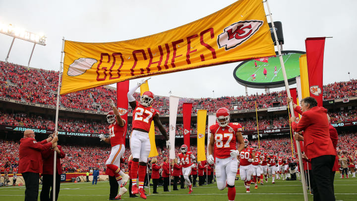 KANSAS CITY, MISSOURI – SEPTEMBER 22: Defensive back Rashad Fenton #27 and tight end Travis Kelce #87 of the Kansas City Chiefs run onto the field during pre-game introductions prior to the game against the Baltimore Ravens at Arrowhead Stadium on September 22, 2019 in Kansas City, Missouri. (Photo by Jamie Squire/Getty Images)