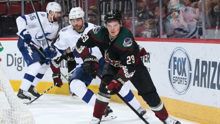 GLENDALE, ARIZONA - FEBRUARY 22: Barrett Hayton #29 of the Arizona Coyotes skates with the puck ahead of Victor Hedman #77 of the Tampa Bay Lightning during the second period of the NHL game at Gila River Arena on February 22, 2020 in Glendale, Arizona. (Photo by Christian Petersen/Getty Images)