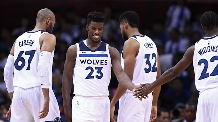 SHENZHEN, CHINA – OCTOBER 05: Jimmy Butler #23, Andrew Wiggins #22, Karl-Anthony Townsand and Taj Gibson #67 of the Minnesota Timberwolves celebrate during the game between the Minnesota Timberwolves and the Golden State Warriors as part of 2017 NBA Global Games China at Universidade Center on October 5, 2017 in Shenzhen, China. (Photo by Zhong Zhi/Getty Images)