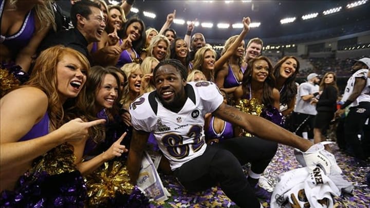 Feb 3, 2013; New Orleans, LA, USA; Baltimore Ravens wide receiver Torrey Smith (82) celebrates with the cheerleaders after defeating the San Francisco 49ers in Super Bowl XLVII at the Mercedes-Benz Superdome. Mandatory Credit: Mark J. Rebilas-USA TODAY Sports