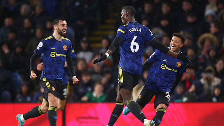 BURNLEY, ENGLAND - FEBRUARY 08: Paul Pogba of Manchester United celebrates after scoring a goal to make it 0-1 during the Premier League match between Burnley and Manchester United at Turf Moor on February 8, 2022 in Burnley, United Kingdom. (Photo by Robbie Jay Barratt - AMA/Getty Images)