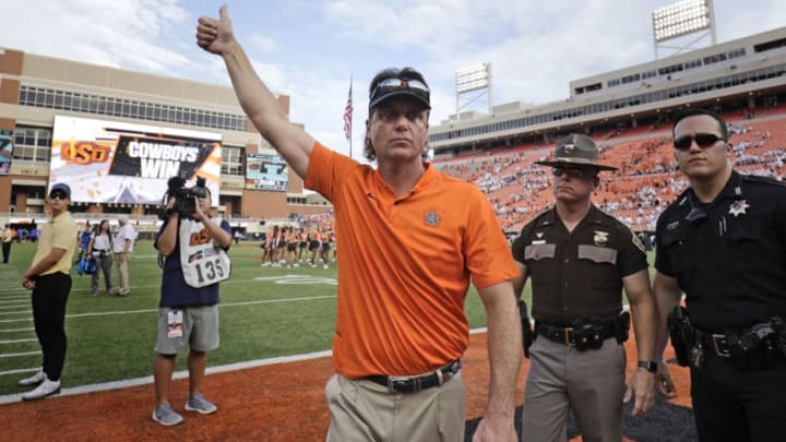 STILLWATER, OK - SEPTEMBER 15: Head Coach Mike Gundy of the Oklahoma State Cowboys leaves the field after the game against the Boise State Broncos at Boone Pickens Stadium on September 15, 2018 in Stillwater, Oklahoma. The Cowboys defeated the Broncos 44-21. (Photo by Brett Deering/Getty Images)