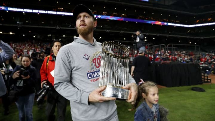 HOUSTON, TX – OCTOBER 30: Stephen Strasburg #37 of the Washington Nationals celebrates with the Commissioner’s Trophy after the Nationals defeated the Houston Astros in Game 7 to win the 2019 World Series at Minute Maid Park on Wednesday, October 30, 2019 in Houston, Texas. (Photo by Rob Tringali/MLB Photos via Getty Images)