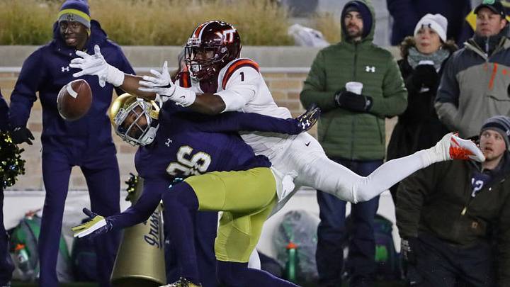 SOUTH BEND, IN - NOVEMBER 19: Cole Luke #36 of the Notre Dame Fighting Irish is called for pass interference against Isaiah Ford #1 of the Virginia Tech Hokies at Notre Dame Stadium on November 19, 2016 in South Bend, Indiana. Virginia Tech defeated Notre Dame 34-31.(Photo by Jonathan Daniel/Getty Images)