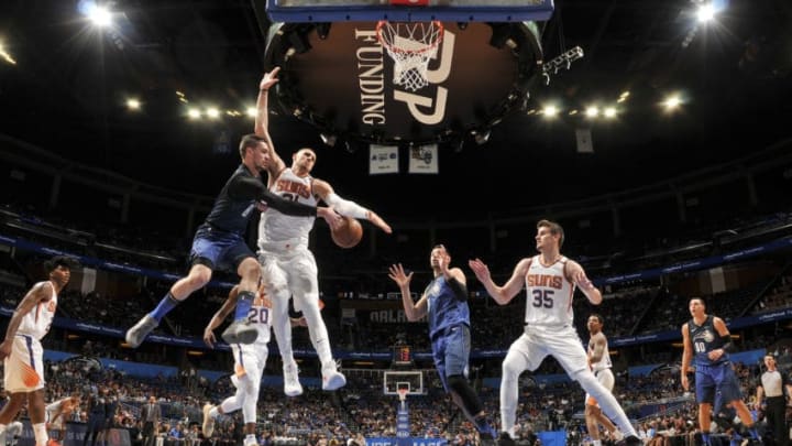 ORLANDO, FL - MARCH 24: Mario Hezonja #8 of the Orlando Magic passes the ball against the Phoenix Suns on March 24, 2018 at Amway Center in Orlando, Florida. NOTE TO USER: User expressly acknowledges and agrees that, by downloading and/or using this photograph, user is consenting to the terms and conditions of the Getty Images License Agreement. Mandatory Copyright Notice: Copyright 2018 NBAE (Photo by Fernando Medina/NBAE via Getty Images)