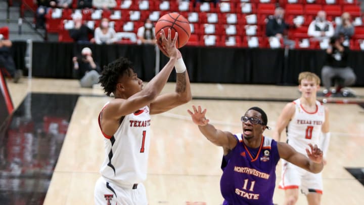 Nov 25, 2020; Lubbock, Texas, USA; Texas Tech Red Raiders guard Terrence Shannon Jr. (1) takes a shot over Northwestern State Demons forward Jamaure Gregg (11) in the first half at United Supermarkets Arena. Mandatory Credit: Michael C. Johnson-USA TODAY Sports