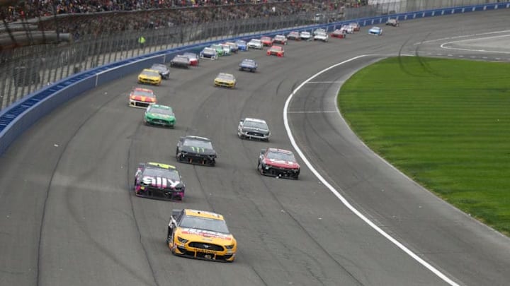 FONTANA, CALIFORNIA - MARCH 01: Ryan Blaney, driver of the #12 BodyArmor Ford, leads a pack of cars in the NASCAR Cup Series Auto Club 400 at Auto Club Speedway on March 01, 2020 in Fontana, California. (Photo by Meg Oliphant/Getty Images) FONTANA, CALIFORNIA - MARCH 01: Ryan Blaney, driver of the #12 BodyArmor Ford, leads a pack of cars in the NASCAR Cup Series Auto Club 400 at Auto Club Speedway on March 01, 2020 in Fontana, California. (Photo by Meg Oliphant/Getty Images)