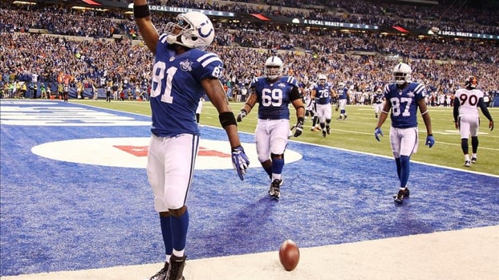 Oct 20, 2013; Indianapolis, IN, USA; Indianapolis Colts wide receiver Darrius Heyward-Bey (81) celebrates after scoring a touchdown against the Denver Broncos during the first half at Lucas Oil Stadium. Mandatory Credit: Brian Spurlock-USA TODAY Sports