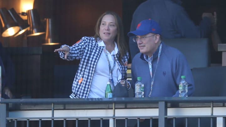 Apr 8, 2021; New York City, New York, USA; New York Mets owner Steve Cohen (right) and his wife Alex watch the seventh inning of an opening day game against the Miami Marlins at Citi Field. Mandatory Credit: Brad Penner-USA TODAY Sports