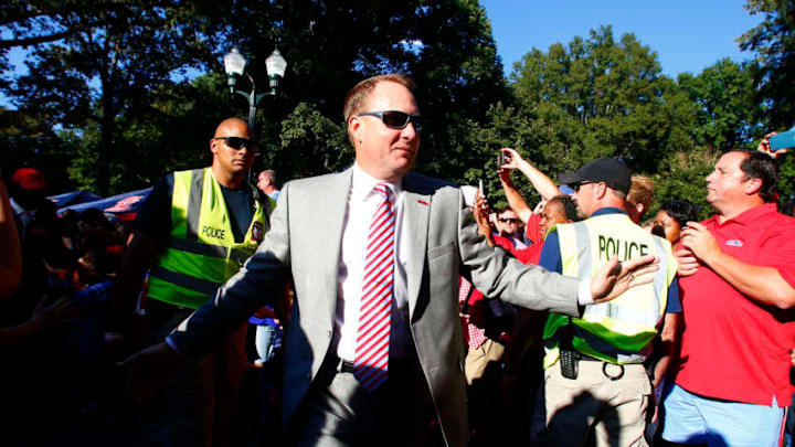 OXFORD, MS - OCTOBER 29: Mississippi Rebels head coach Hugh Freeze greets fans as they walk down the Walk of Champions in the Grove before an NCAA college football game against the Auburn Tigers on October 29, 2016 in Oxford, Mississippi. (Photo by Butch Dill/Getty Images)