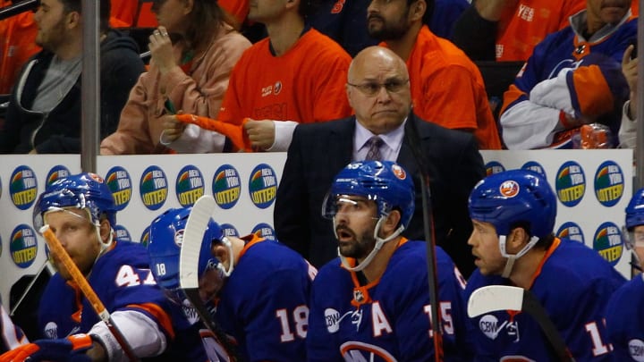 NEW YORK, NEW YORK – APRIL 26: Head Coach of the New York Islanders Barry Trotz looks on from behind the bench during Game One of the Eastern Conference Second Round against the Carolina Hurricanes during the 2019 NHL Stanley Cup Playoffs at Barclays Center on April 26, 2019 in New York City. (Photo by Mike Stobe/NHLI via Getty Images)