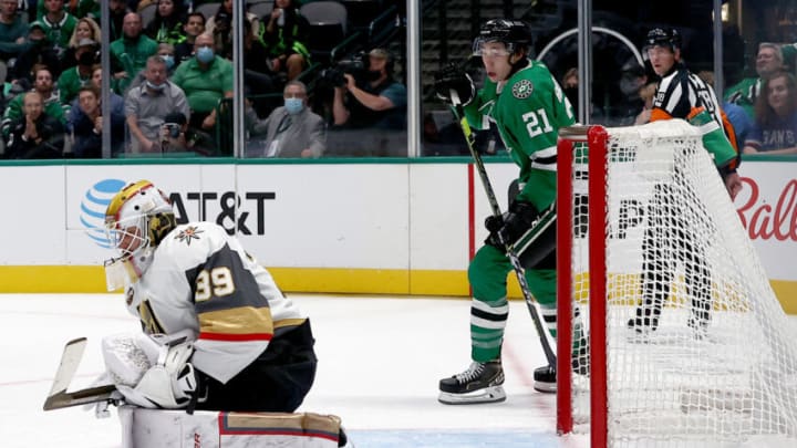 DALLAS, TEXAS - OCTOBER 27: Laurent Brossoit #39 of the Vegas Golden Knights blocks a shot on goal against the Dallas Stars in the the first period at American Airlines Center on October 27, 2021 in Dallas, Texas. (Photo by Tom Pennington/Getty Images)