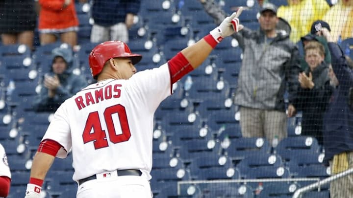 May 14, 2016; Washington, DC, USA; Washington Nationals catcher Wilson Ramos (40) gestures to the stands after hitting a home run against the Miami Marlins in the sixth inning at Nationals Park. The Nationals won 6-4. Mandatory Credit: Geoff Burke-USA TODAY Sports