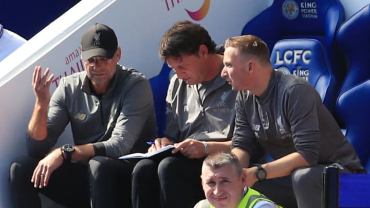 LEICESTER, ENGLAND - SEPTEMBER 01: Jurgen Klopp, Manager of Liverpool speaks with staff members during the Premier League match between Leicester City and Liverpool FC at The King Power Stadium on September 1, 2018 in Leicester, United Kingdom. (Photo by Marc Atkins/Getty Images)