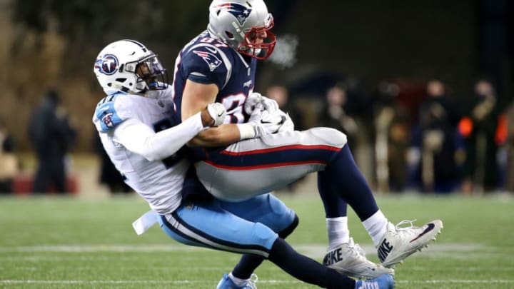 FOXBOROUGH, MA - JANUARY 13: Rob Gronkowski #87 of the New England Patriots catches a pass as he is defended by Kevin Byard #31 of the Tennessee Titans during the fourth quarter in the AFC Divisional Playoff game at Gillette Stadium on January 13, 2018 in Foxborough, Massachusetts. (Photo by Jim Rogash/Getty Images)
