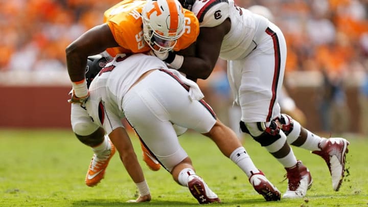 KNOXVILLE, TN - OCTOBER 14: Reginald McKenzie Jr. #99 of the Tennessee Volunteers sacks Jake Bentley #19 of the South Carolina Gamecocks during the first half at Neyland Stadium on October 14, 2017 in Knoxville, Tennessee. (Photo by Michael Reaves/Getty Images)