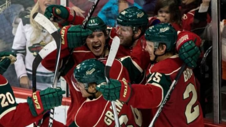 Dec 9, 2014; Saint Paul, MN, USA; Minnesota Wild forward Thomas Vanek (26) celebrates his goal with teammates during the third period against the New York Islanders at Xcel Energy Center. The Wild defeated the Islanders 5-4. Mandatory Credit: Brace Hemmelgarn-USA TODAY Sports