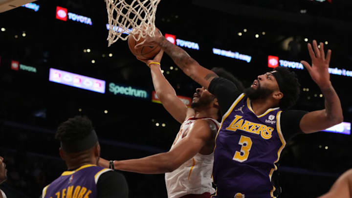 Oct 29, 2021; Los Angeles, California, USA; Los Angeles Lakers forward Anthony Davis (3) plays for the ball against Cleveland Cavaliers center Jarrett Allen (31) during the first half at Staples Center. Mandatory Credit: Kirby Lee-USA TODAY Sports Oct 29, 2021; Los Angeles, California, USA; Los Angeles Lakers forward Anthony Davis (3) plays for the ball against Cleveland Cavaliers center Jarrett Allen (31) during the first half at Staples Center. Mandatory Credit: Kirby Lee-USA TODAY Sports