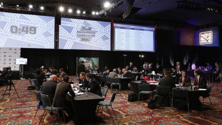 INDIANAPOLIS, IN - JANUARY 17: Teams work at their respective tables during the 2013 MLS SuperDraft Presented by Adidas at the Indiana Convention Center on January 17, 2013 in Indianapolis, Indiana. (Photo by Joe Robbins/Getty Images)