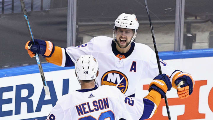 TORONTO, ONTARIO – AUGUST 12: Josh Bailey #12 of the New York Islanders celebrates his short-handed goal at 6:52 of the third period against the Washington Capitals and is joined by Brock Nelson #29 in Game One of the Eastern Conference First Round during the 2020 NHL Stanley Cup Playoffs at Scotiabank Arena on August 12, 2020 in Toronto, Ontario, Canada. (Photo by Elsa/Getty Images)
