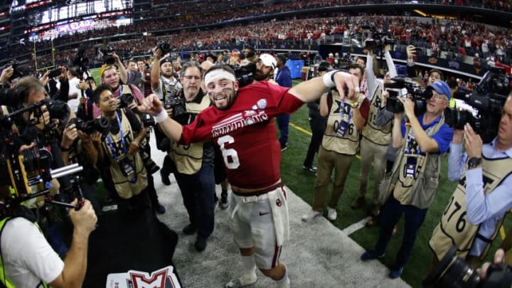 ARLINGTON, TX - DECEMBER 2: Baker Mayfield #6 of the Oklahoma Sooners celebrates after defeating the TCU Horned Frogs 41-17 in the Big 12 Championship AT&T Stadium on December 2, 2017 in Arlington, Texas. (Photo by Ron Jenkins/Getty Images)