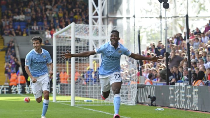 Manchester City's Nigerian striker Kelechi Iheanacho (R) celebrates scoring the winning goal during the English Premier League football match between Crystal Palace and Manchester City at Selhurst Park in London on September 12, 2015. AFP PHOTO / GLYN KIRK RESTRICTED TO EDITORIAL USE. No use with unauthorized audio, video, data, fixture lists, club/league logos or 'live' services. Online in-match use limited to 75 images, no video emulation. No use in betting, games or single club/league/player publications. (Photo credit should read GLYN KIRK/AFP/Getty Images)