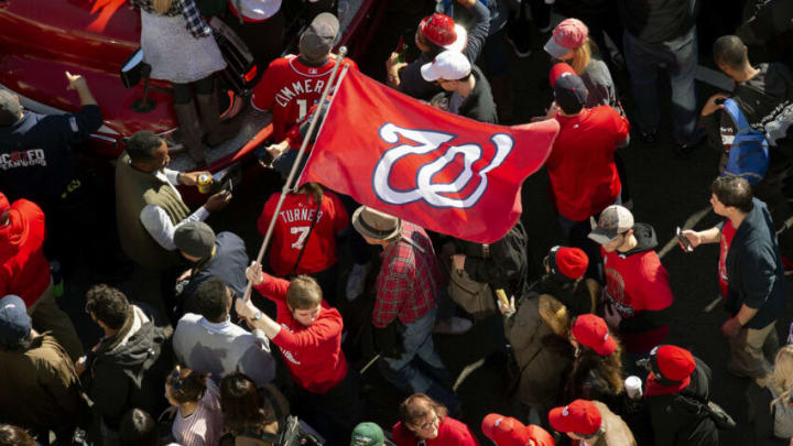 WASHINGTON, DC - NOVEMBER 02: Fans attend a parade to celebrate the Washington Nationals World Series victory over the Houston Astros on November 2, 2019 in Washington, DC. This is the first World Series win for the Nationals in 95 years. (Photo by Stefani Reynolds/Getty Images)