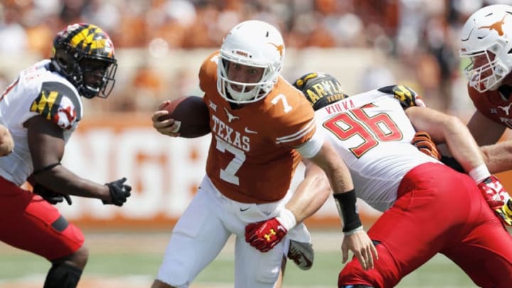 AUSTIN, TX - SEPTEMBER 02: Shane Buechele #7 of the Texas Longhorns scrambles and is tackled by Brett Kulka #96 of the Maryland Terrapins in the second quarter at Darrell K Royal-Texas Memorial Stadium on September 2, 2017 in Austin, Texas. (Photo by Tim Warner/Getty Images)