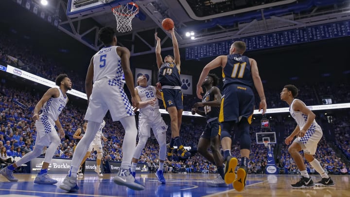 LEXINGTON, KY – DECEMBER 01: Kyrin Galloway #14 of the UNC-Greensboro Spartans shoots the ball against Reid Travis #22 of the Kentucky Wildcats at Rupp Arena on December 1, 2018 in Lexington, Kentucky. (Photo by Michael Hickey/Getty Images)