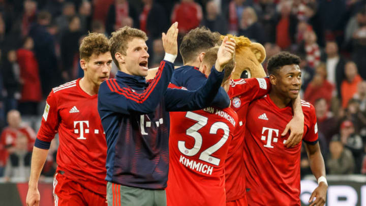 MUNICH, GERMANY - APRIL 06: Leon Goretzka of FC Bayern Muenchen, Thomas Mueller of FC Bayern Muenchen, Joshua Kimmich of FC Bayern Muenchen, David Alaba of FC Bayern Muenchen celebrate after the Bundesliga match between FC Bayern Muenchen and Borussia Dortmund at Allianz Arena on April 06, 2019 in Munich, Germany. (Photo by TF-Images/Getty Images)
