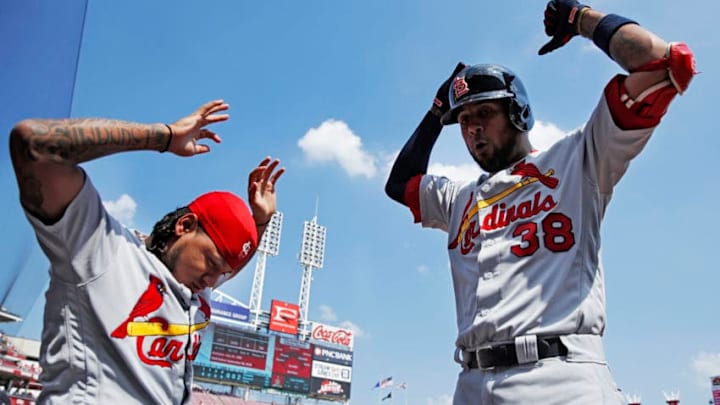 CINCINNATI, OH - JUNE 09: Jose Martinez #38 of the St. Louis Cardinals celebrates with Carlos Martinez #18 after hitting a solo home run in the first inning against the Cincinnati Reds at Great American Ball Park on June 9, 2018 in Cincinnati, Ohio. (Photo by Joe Robbins/Getty Images)